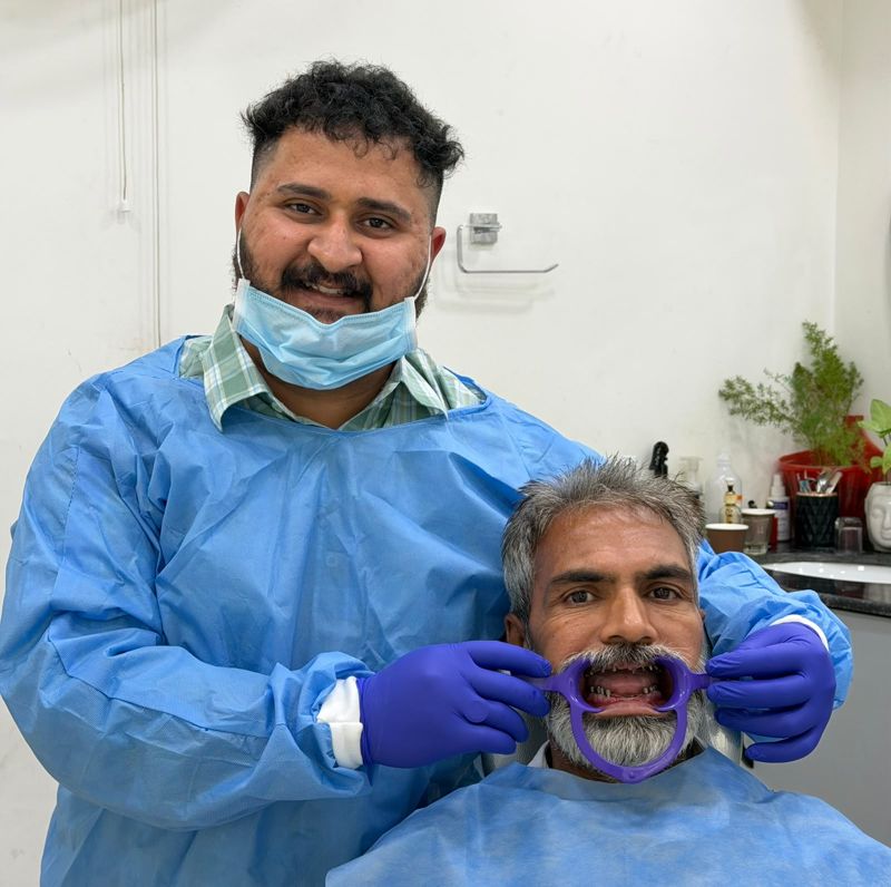 Implants placed, patient with the implantologist